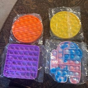 Four Pop-it’s still in packages